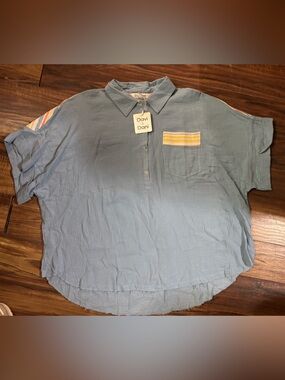 Davi and Dani blue button collar pockets medium oversized gauzy top raw hem